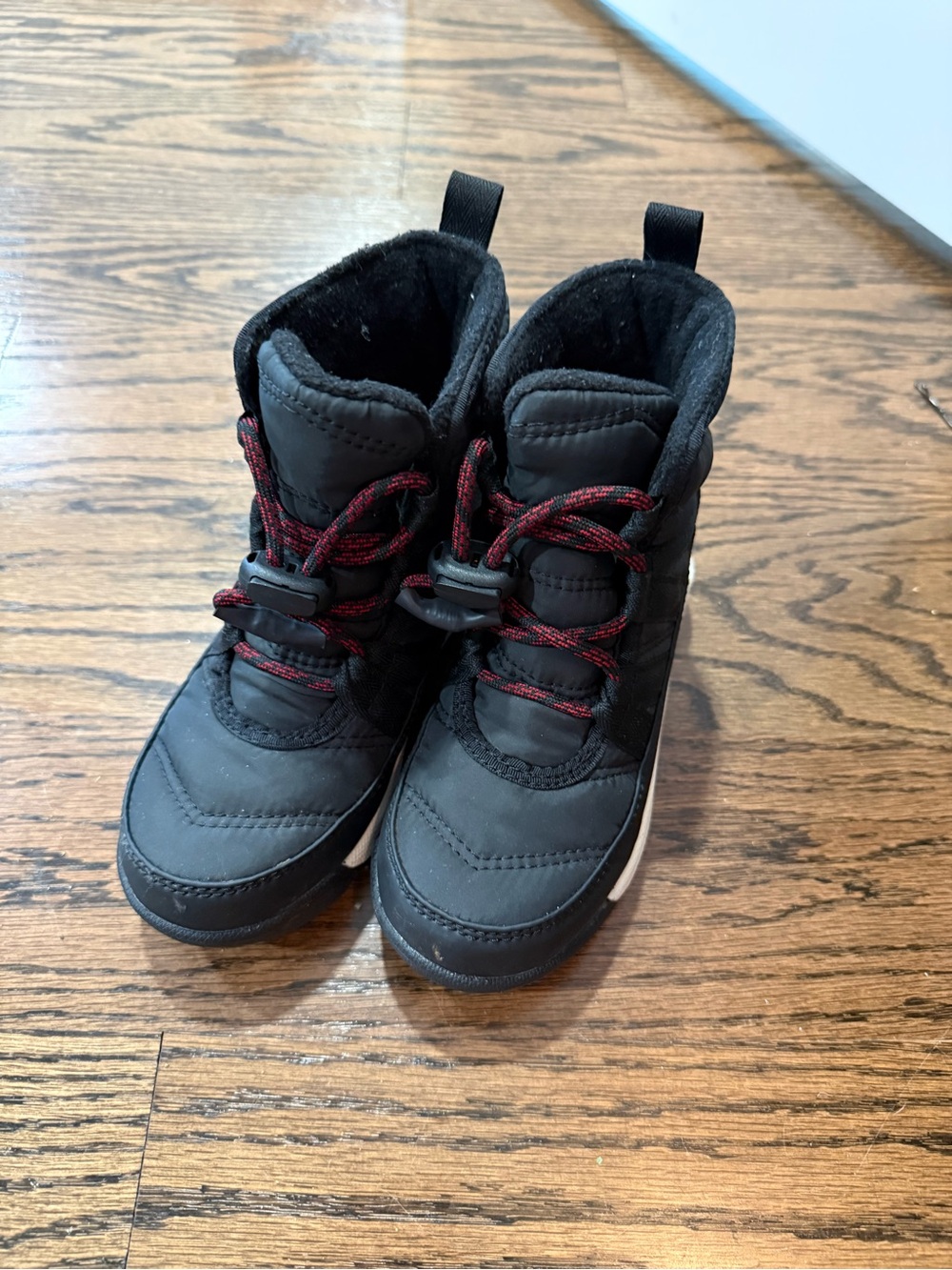 Sorel Kids Black Snow Boots with Red Laces